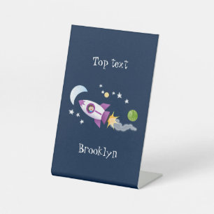 Cute rocket ship in space cartoon illustration pedestal sign
