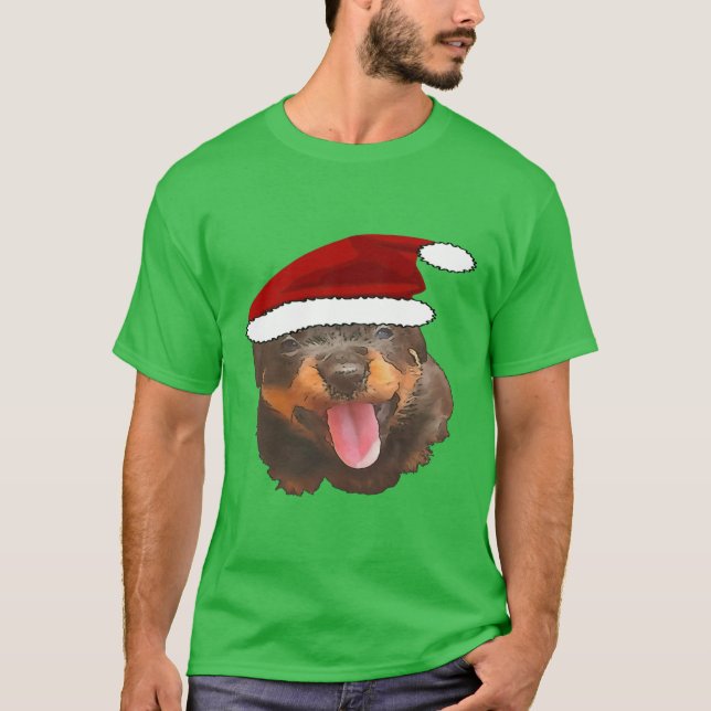 Cute Rottweiler Pup Wearing Holiday Santa Hat T-Shirt (Front)