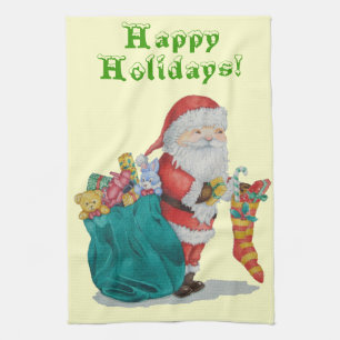 cute santa smiling and getting ready for christmas tea towel