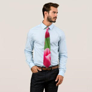 Cute scarlet tulips in the garden tie