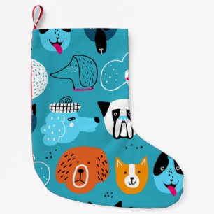 Cute seamless pattern with funny dogs on a blue ba small christmas stocking