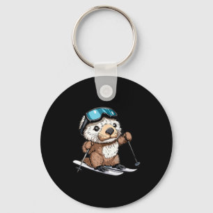 Cute skiing sea otter key ring