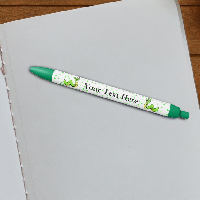 Cute Smiling Cartoon Green Yellow Snake Black Ink Pen (Fun cartoon bright green yellow happy snakes on white with green dots writing pen.)