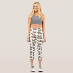 Cute smiling sloth on bamboo cartoon illustration capri leggings