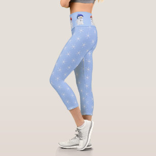 Cute snowman and snowflake pattern on light blue capri leggings