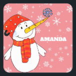 Cute Snowman and Snowflakes Kids Christmas Square Sticker<br><div class="desc">Cute Snowman and Snowflakes Kids Christmas Square Sticker. Snowman Christmas holiday gift sticker for children. Christmas gift stickers - personalise the stickers with child`s name. The sticker has a cute snowman with a snowflake on his nose. The background is pink with beautiful white snowflakes in different sizes and shapes. Make...</div>
