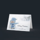 Cute Snowman in Winter Photograph Christmas Card<br><div class="desc">Christmas card with a cute photograph with a little snowman. Standing outside in the winter with snow falling all around. This cute little guy is dressed up in blue knitted outdoor clothing. Some white/grey bokeh flare in the background.</div>