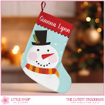 Cute Snowman Monogram Kids Small Christmas Stocking<br><div class="desc">Celebrate the holiday season with this charming Christmas stocking that features an illustration of a snowman wearing a top hat adorned with holly leaves and berries. The snowman, complete with a carrot nose, cosy winter scarf, and delicate snowflakes, is framed by a trendy scalloped edge border. This design will add...</div>