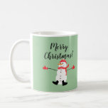 Cute Snowman on Sage Green Merry Christmas Coffee Mug<br><div class="desc">This is cute minimal Christmas design that features a naive digital painting of a snowman wearing matching red hat,  scarf and mittens on a sage green background with the text: Merry Christmas! You can easily customise it. Just replace the text with your own details.</div>