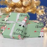 Cute Snowman on Sage Green Merry Christmas Wrapping Paper<br><div class="desc">This is cute minimal Christmas design that features a naive digital painting of a snowman wearing matching red hat,  scarf and mittens on a sage green background with the text: Merry Christmas! and the design tiled in a half drop to cover the entire paper. #holiday #giftwrap</div>