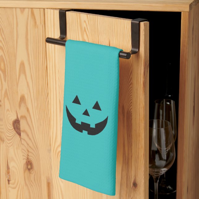 Cute teal jack o lantern pumpkin face Halloween Tea Towel (Thirds Fold)