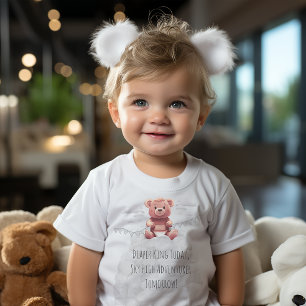 cute teddy bear on pile of diapers 1st Birthday  Baby T-Shirt
