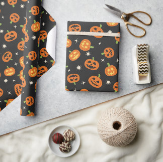 Cute tossed Halloween Pumpkins pattern on black  Wrapping Paper