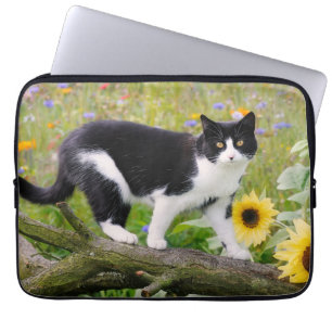 Cute tuxedo cat on a tree branch with sunflowers / laptop sleeve