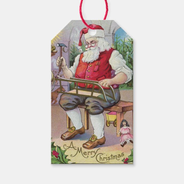Cute Vintage Santa Making a Sled Gift Tag (Front)