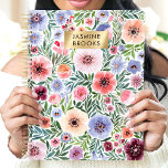 Cute Watercolor Floral Custom Name Planner<br><div class="desc">Stay organised in style with this beautiful floral planner! Featuring a vibrant watercolor design in shades of pink, purple, and blue, this planner is perfect for keeping track of appointments, to-dos, and important dates. The gold nameplate adds a touch of elegance and personalisation, making it a unique and thoughtful gift....</div>