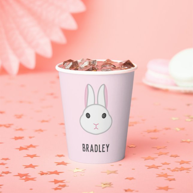 Cute white bunny on pink paper cups (Insitu)
