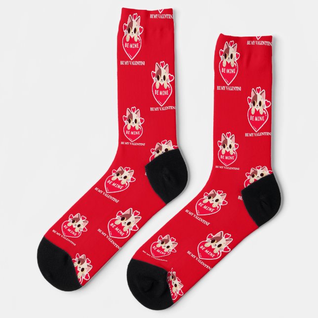 Cute white kitten with heart socks (Left)