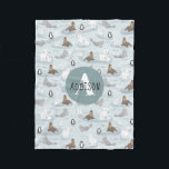 Cute Winter Arctic Animals Blue Monogram Kids Fleece Blanket<br><div class="desc">This whimsical and cosy blanket features a blue winter pattern, with cute Arctic animals including a polar bear, penguin, seal, and walrus illustration. There is also space on the blanket to add you own customisation: a name and monogram in an elegant typography. The perfect Christmas gift for any animal lover...</div>