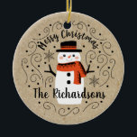 Cute Winter Christmas Snowman Ceramic Tree Decoration<br><div class="desc">A cute Christmas snowman with the words Merry Christmas decorates this ornament. Personalise it with your family name. A fun accent for the Christmas holiday season. Designed for you by Blackberry Boulevard.</div>
