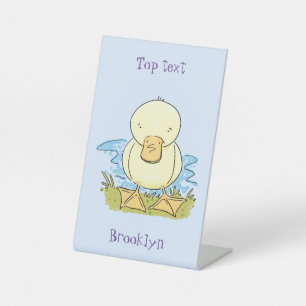 Cute yellow baby duckling cartoon illustration pedestal sign
