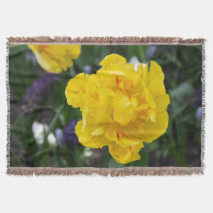 Cute yellow tulips in the garden throw blanket