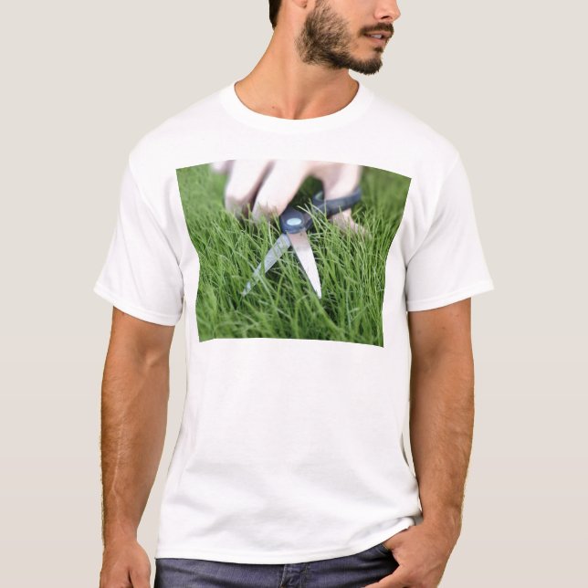 Cutting the grass with a pair of scissors T-Shirt (Front)