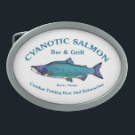 Cyanotic Salmon Bar & Grill Belt Buckle<br><div class="desc">A blue-toned Sockeye Salmon with text reading "Cyanotic Salmon Bar & Grill Kenai, Alaska" and "Combat Fishing Rest And Relaxation. Fishing for salmon is very popular, too popular in Alaska. Imagine hundred of anglers, just about shoulder to shoulder, lining both banks of a stream trying to avoiding crossing lines with...</div>