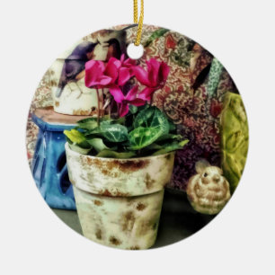 Cyclamen in Flowerpot and Ceramic Bird Tree Decoration