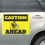 Cyclists ahead warning | Caution magnetic signs<br><div class="desc">Create awareness with this safety sign that has the word caution in yellow set on a bright yellowing background that has the silhouette of two professional cyclists cycling which warns motorists that they must reduce speed and keep a distance from the cyclists.</div>
