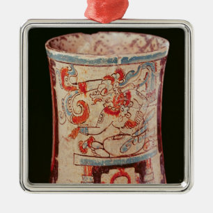 Cylindrical depicting a deity with speech curls metal tree decoration