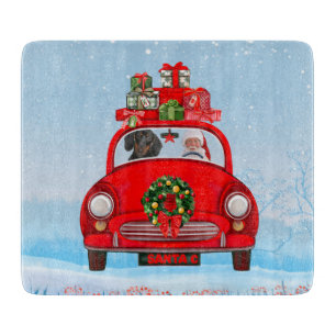 Dachshund Dog In Car With Santa Claus Cutting Board