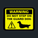 Dachshund Guard Dog Warning (Longhaired Doxie) Magnet<br><div class="desc">Yellow and Black Warning Sign Magnet with Longhaired Dachshund Silhouette. Warning: Do Not Step on the Guard Dog. Funny caution sign for wiener dog lovers. A humourous fridge magnet for anyone who has a longhaired miniature or standard weenie dog. This design can be personalised with your own text.</div>