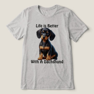 Dachshund Puppy Sitting and Looking with Innocent Tri-Blend Shirt