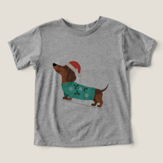 Dachshund wearing Christmas Sweater & Santa Hat