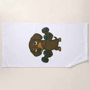Dachshund with dumbbell fitness training biceps wo beach towel