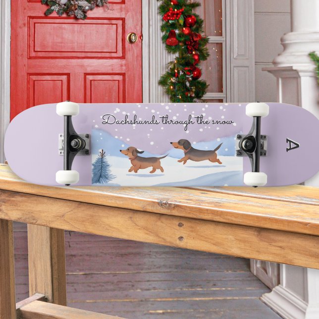 Dachshunds Through The Snow Monogrammed Christmas Skateboard (A skateboard with 'Dachshunds through the snow' caption and cute cartoon of sausage dogs)