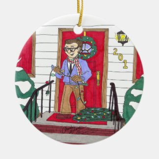 Dad putting up Christmas lights ornament