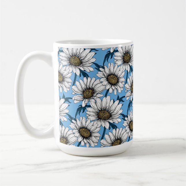 Daisies, wild flowers on blue coffee mug (Left)