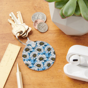 Daisies, wild flowers on blue key ring