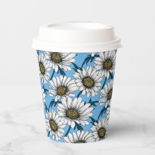 Daisies, wild flowers on blue paper cups
