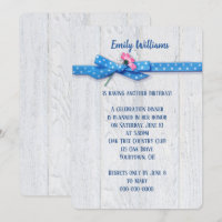 daisy and polka dot ribbon on wood background