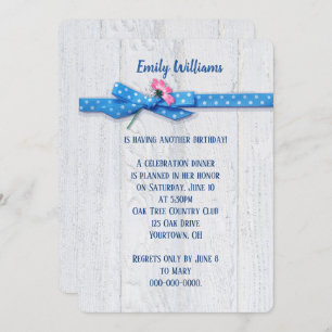 daisy and polka dot ribbon on wood background invitation