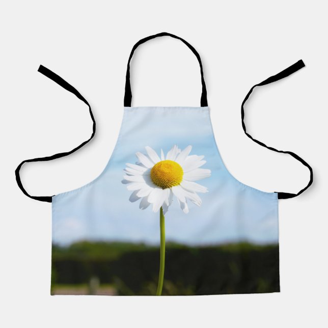 Daisy standing upright in nature. apron (Front)