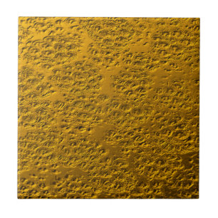 Damaged gold metal tile