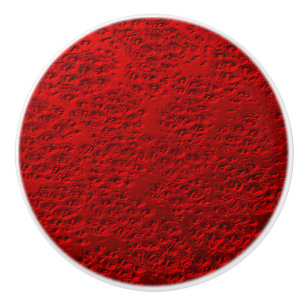 Damaged red metal ceramic knob