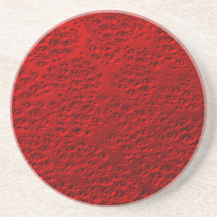 Damaged red metal coaster