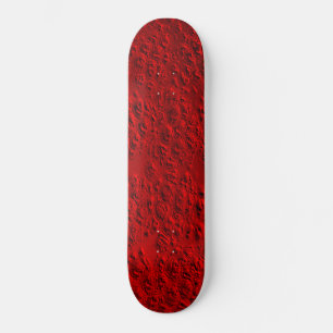 Damaged red metal skateboard