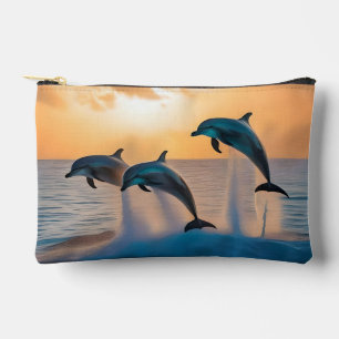 Dancing in the Dusk: Three Dolphins Leaping Accessory Pouch