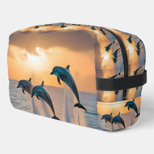 Dancing in the Dusk: Three Dolphins Leaping  Dopp Kit